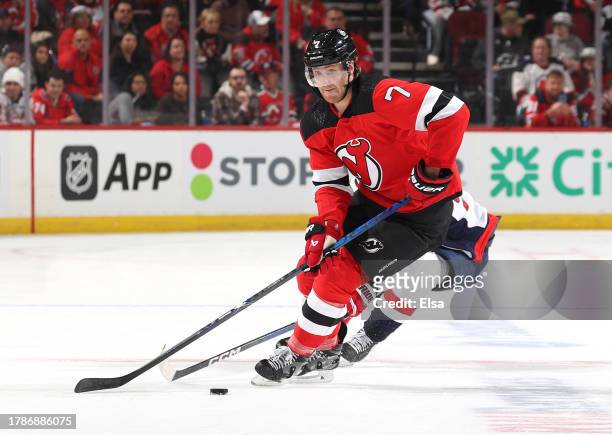 Dougie Hamilton of the New Jersey Devils takes the puck during the third period against the Washington Capitals at Prudential Center on November 10,...