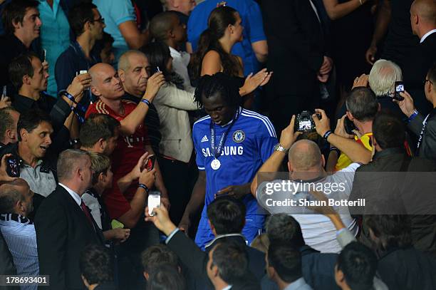 Fans take pictures of Romelu Lukaku of Chelsea after he collected his runners up medal during the UEFA Super Cup between Bayern Muenchen and Chelsea...