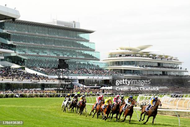 The field rounds the bend in the Queen Elizabeth Stakes during Stakes Day at Flemington Racecourse on November 11, 2023 in Melbourne, Australia.