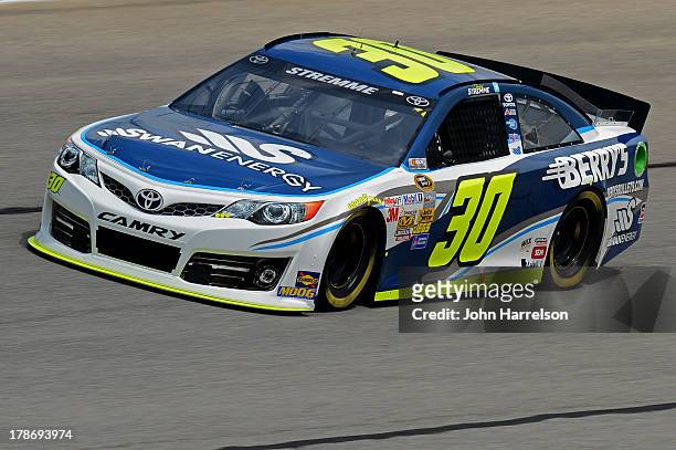 David Stremme, driver of the Swan Energy / Berry's Toyota, practices for the NASCAR Sprint Cup Series AdvoCare 500 at Atlanta Motor Speedway on...