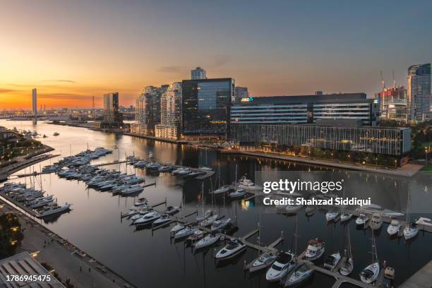 sunset over docklands - yarra stock pictures, royalty-free photos & images