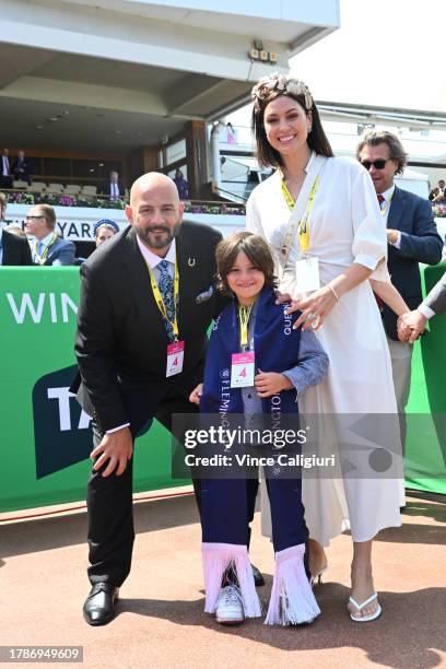 Ozzie Kheir is seen with family after Muramasa won Race 4, the Queen Elizabeth Stakes, during Stakes Day at Flemington Racecourse on November 11,...