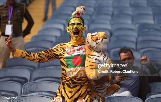 Spectator reacts in the crowd ahead of the ICC Men's Cricket World Cup India 2023 between Australia and Bangladesh at MCA International Stadium on...