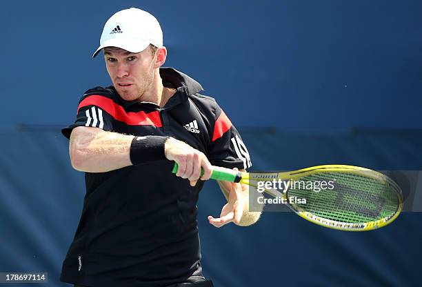 John Peers of Australia in action next to partner Jamie Murrary of Great Britain during their men's doubles second round match against Feliciano...
