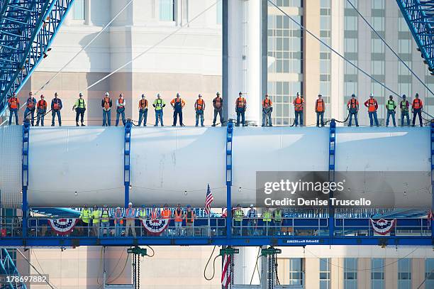 Iron workers employed by American Bridge Ugo Del Costello, Robert Conway, James McCullough, Stuart Shew, Shawn McClelland, Cory Zobrist, Thomas Pype,...