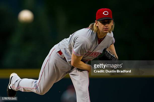 Bronson Arroyo of the Cincinnati Reds throws a pitch against the Colorado Rockies during the first inning of a game at Coors Field on August 30, 2013...
