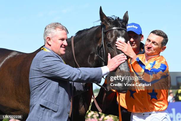 Opie Bosson poses with trainer Mark Walker after riding Imperatriz to win Race 6, the Darley Champions Sprint,during Stakes Day at Flemington...