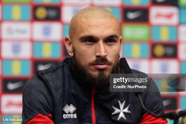 Teddy Teuma of Malta speaks during his team's press conference on the eve of the UEFA EURO 2024 group C qualification round match between England and...