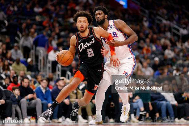 Cade Cunningham of the Detroit Pistons drives to the basket against Joel Embiid of the Philadelphia 76ers in the fourth quarter of a game at Little...