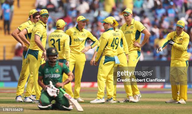 Players of Australia celebrates the wicket of Najmul Hossain Shanto of Bangladesh during the ICC Men's Cricket World Cup India 2023 between Australia...