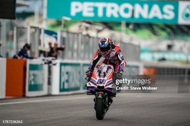Jorge Martin of Spain and Prima Pramac Racing celebrates his second position with a Stoppie during the Sprint race of the MotoGP PETRONAS Grand Prix...