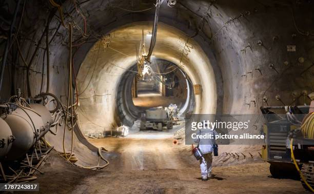 November 2023, Lower Saxony, Salzgitter: A miner walks underground in the Konrad mine. The former iron ore mine is the first final repository for low...