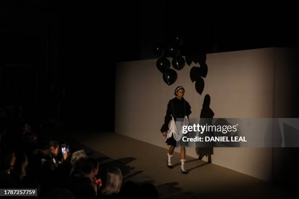 Model presents a creation during the Central Saint Martins BA Fashion Design Womenswear course fashion show called "V&A's Fashion in Motion: Inspired...