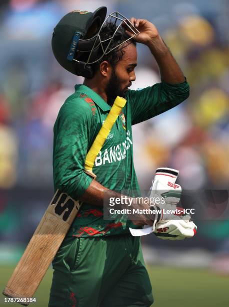 Towhid Hridoy of Bangladesh makes his way off after being dismissed during the ICC Men's Cricket World Cup India 2023 between Australia and...