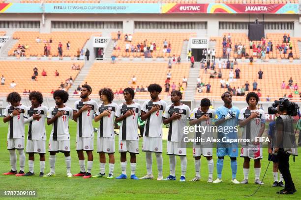 Players of New Caledonia line up during the FIFA U-17 World Cup Group C match between New Caledonia and England at Jakarta International Stadium on...