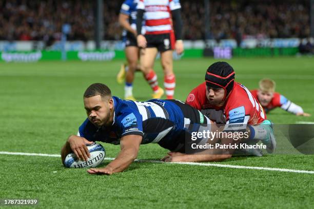 Ollie Lawrence of Bath Rugby scores his team's first try during the Gallagher Premiership Rugby match between Gloucester Rugby and Bath Rugby at...