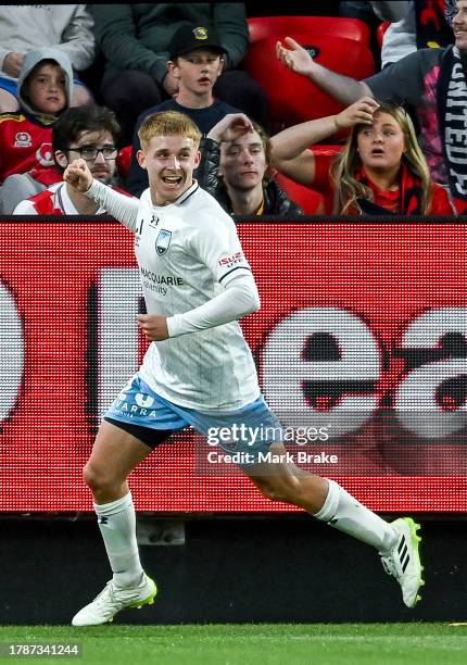 Luke Brattan of Sydney FC celebrates after scoring his teams third goal during the A-League Men round four match between Adelaide United and Sydney...