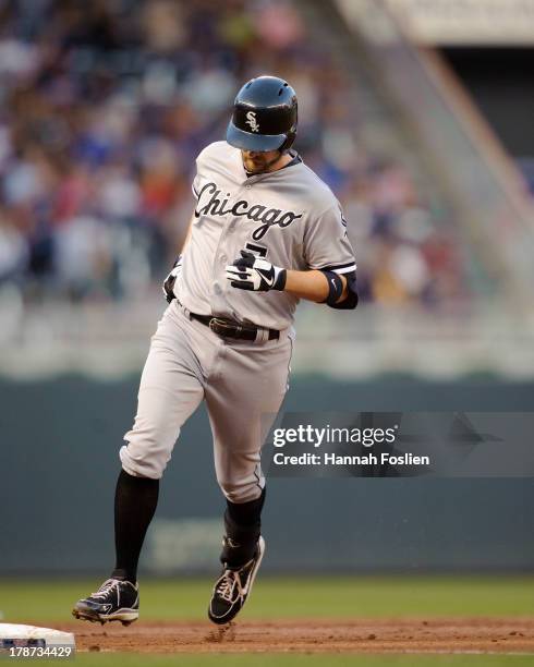 Jeff Keppinger of the Chicago White Sox rounds the bases after he hit a home run against the Minnesota Twins on August 16, 2013 at Target Field in...