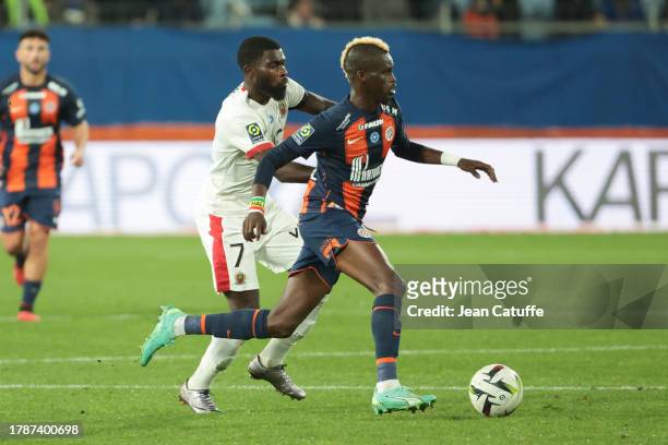 Falaye Sacko of Montpellier, left Jeremie Boga of Nice in action during the Ligue 1 Uber Eats match between Montpellier HSC and OGC Nice at Stade de...