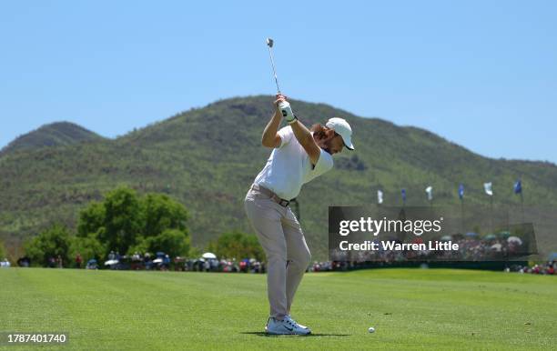 Tommy Fleetwood of England plays his second shot on the first hole during the third round of the Nedbank Golf Challenge at Gary Player CC on November...