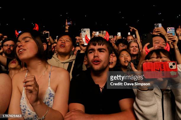 Fans watch Sam Smith perform at Spark Arena on November 11, 2023 in Auckland, New Zealand. Auckland is the 69th and final date on Sam Smith's 'GLORIA...