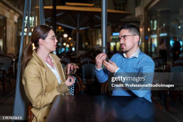 couple connects through sign language, creating a symphony of love - how to say your beautiful in sign language stock pictures, royalty-free photos & images