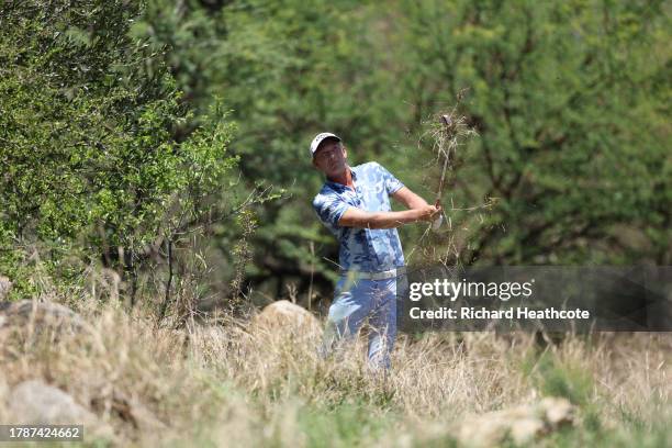 Marcel Siem of Germany plays from the scrub on the second hole during Day Three of the Nedbank Golf Challenge at Gary Player CC on November 11, 2023...