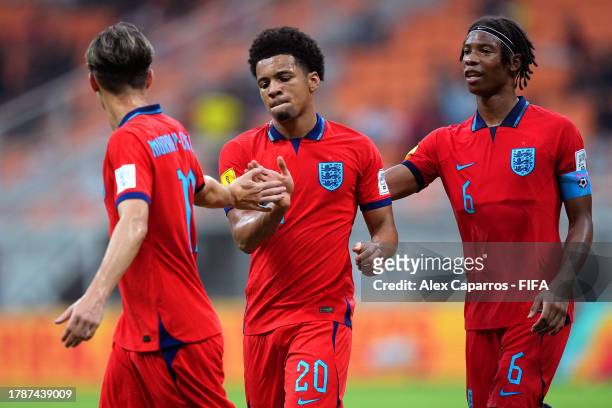 Ethan Nwaneri of England celebrates scoring his teams seventh goal during the FIFA U-17 World Cup Group C match between New Caledonia and England at...