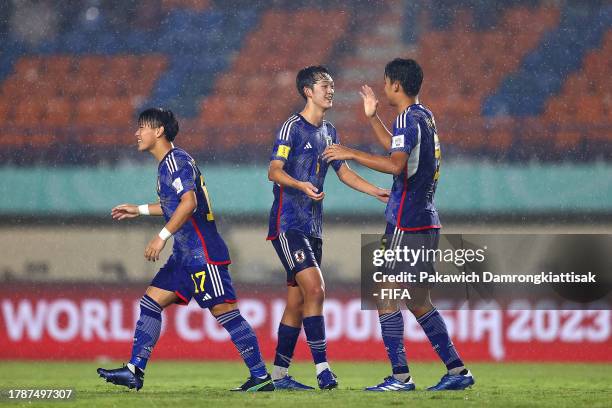 Kotaro Honda and Joi Yamamoto of Japan celebrate victory during the FIFA U-17 World Cup Group D match between Japan and Poland at Si Jalak Harupat...