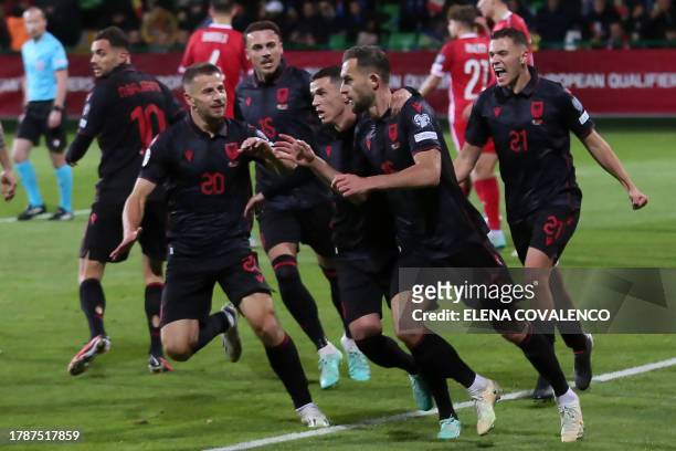 Albania's forward Sokol Cikalleshi celebrates after he scored his team's first goal during the UEFA Euro 2024 Group E qualifying football match...