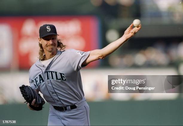 Pitcher Randy Johnson of the Seattle Mariners throws the ball during a game against the Baltimore Orioles at Camden Yards in Baltimore, Maryland. The...