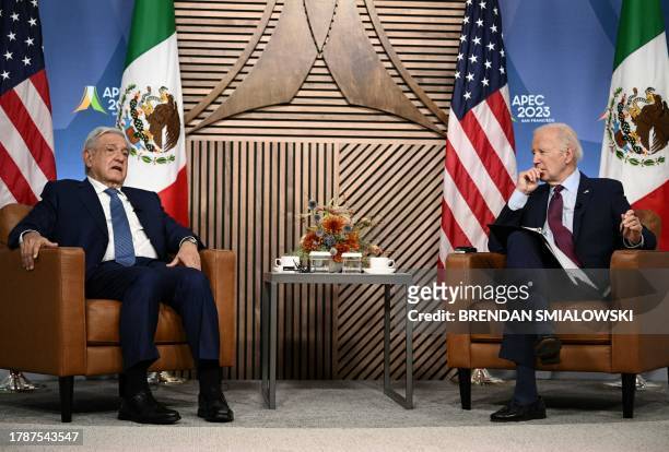 President Joe Biden looks on as Mexican President Andres Manuel Lopez Obrador speaks during a bilateral meeting on the last day of the Asia-Pacific...