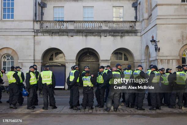 Police file up at horseguards parade as part of the Met Police's 'ring of steel' ahead of the the Armistice Day remembrance service on November 11,...