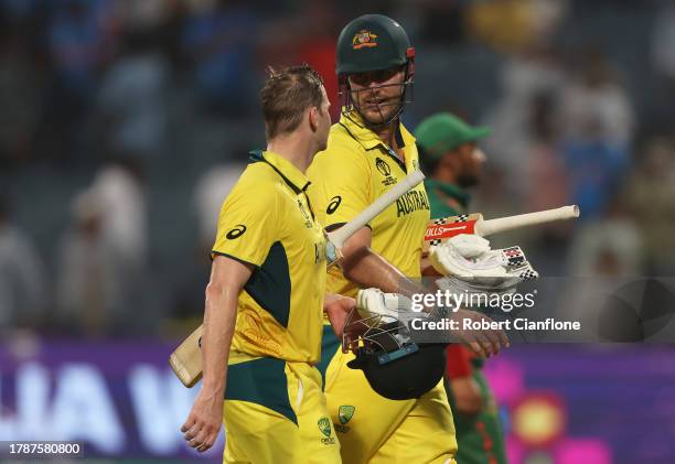 Steve Smith and Mitch Marsh of Australia celebrate following the ICC Men's Cricket World Cup India 2023 between Australia and Bangladesh at MCA...