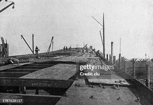 Ship building working on the upper deck Ship building working on the upper deck
