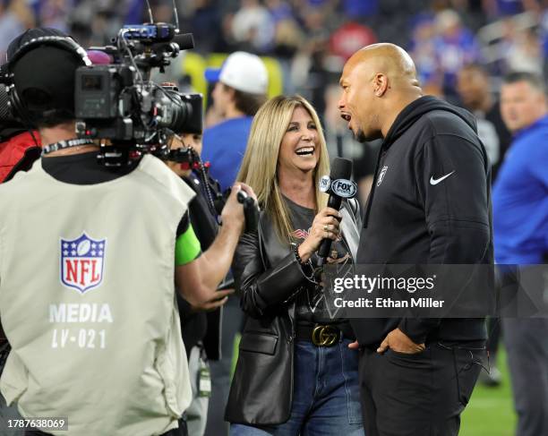 Fox Sports reporter Laura Okmin interviews interim head coach Antonio Pierce of the Las Vegas Raiders after the team's 30-6 victory over the New York...