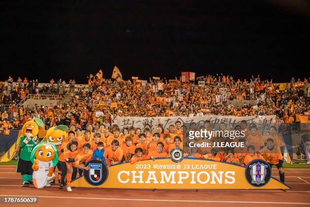 Ehime FC players celebrate their victory after the J.LEAGUE Meiji Yasuda J3 35th Sec. Match between Ehime FC and FC Imabari at Ningineer Stadium on...