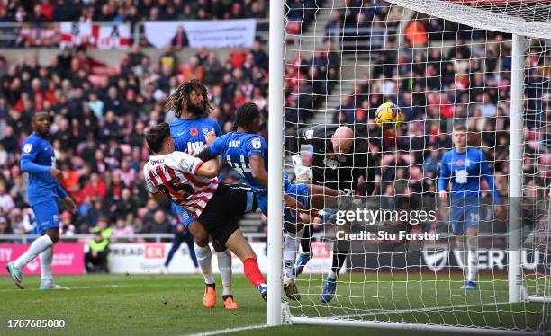 Sunderland player Nectar Triantis beats Birmingham defender Emanuel Aiwu to score the second goal during the Sky Bet Championship match between...
