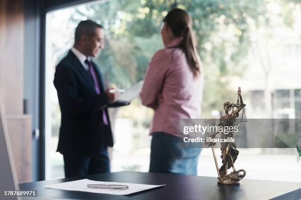 lawyer and client having a business meeting - judge law stock pictures, royalty-free photos & images