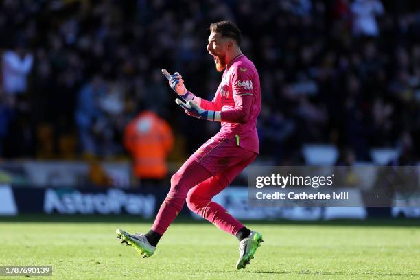 Jose Sa of Wolverhampton Wanderers celebrates after teammate Pablo Sarabia scores the team's first goal during the Premier League match between...