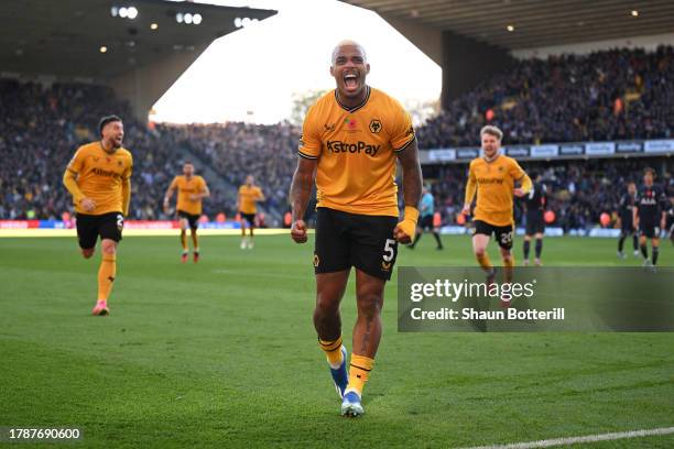 Mario Lemina of Wolverhampton Wanderers celebrates after scoring the team's second goal during the Premier League match between Wolverhampton...