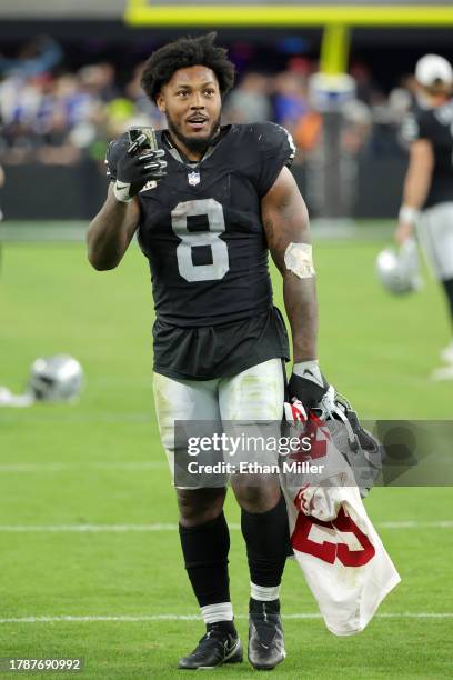 Running back Josh Jacobs of the Las Vegas Raiders walks off the field after the team's 30-6 victory over the New York Giants at Allegiant Stadium on...