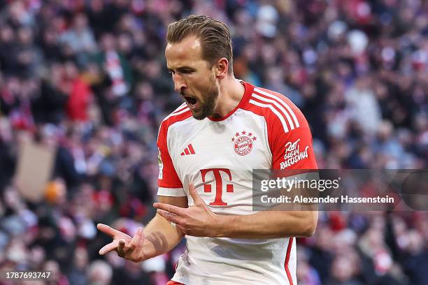 Harry Kane of Bayern Munich celebrates after scoring the team's first goal during the Bundesliga match between FC Bayern München and 1. FC Heidenheim...