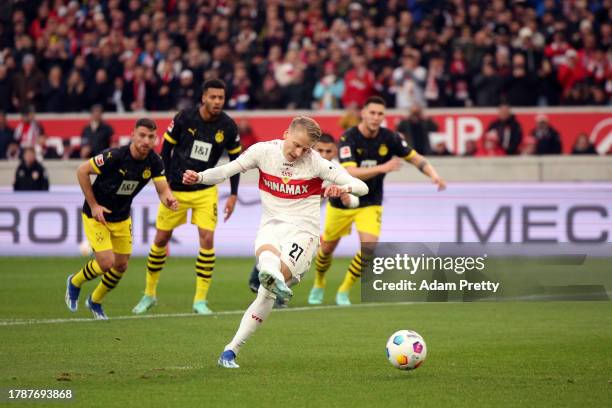 Gregor Kobel of Borussia Dortmund saves a penalty kick from Chris Fuehrich of VfB Stuttgart during the Bundesliga match between VfB Stuttgart and...