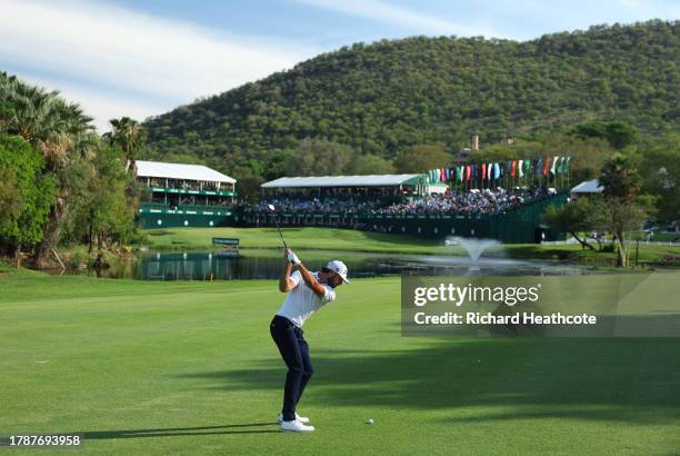 Max Homa of the USA plays into the 18th green during Day Three of the Nedbank Golf Challenge at Gary Player CC on November 11, 2023 in Sun City,...