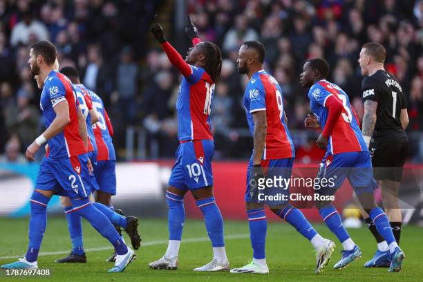 Eberechi Eze of Crystal Palace celebrates after scoring the team's first goal from the penalty spot during the Premier League match between Crystal...