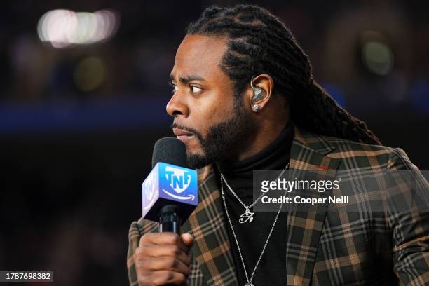 Richard Sherman on set of the Amazon Prime TNF halftime show during an NFL football game between the Carolina Panthers and the Chicago Bears at...