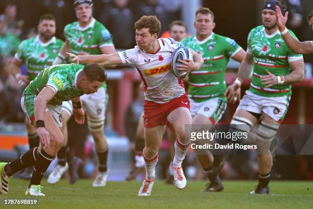 Will Porter of Harlequins holds off Freddie Steward during the Gallagher Premiership Rugby match between Leicester Tigers and Harlequins at Mattioli...