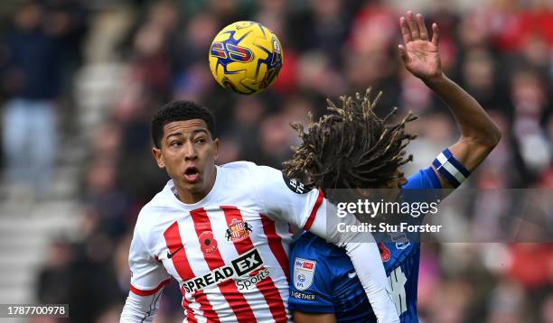 Sunderland player Jobe Bellingham is challenged by Dion Sanderson of Birmingham during the Sky Bet Championship match between Sunderland and...