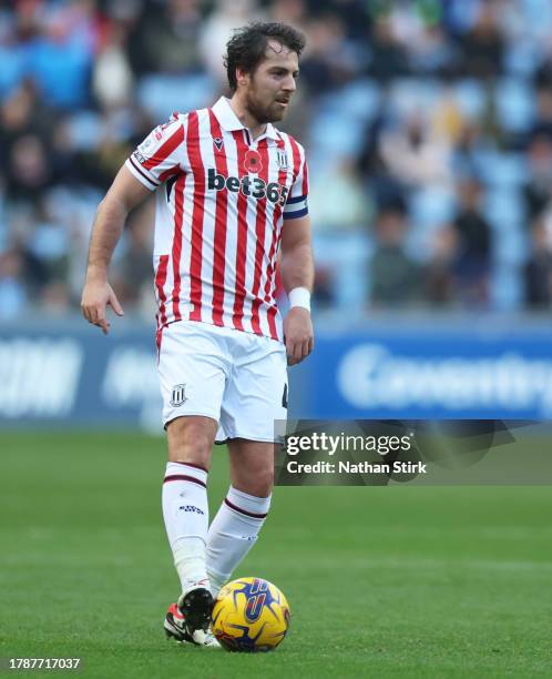 Ben Pearson of Stoke City runs with the ball during the Sky Bet Championship match between Coventry City and Stoke City at The Coventry Building...